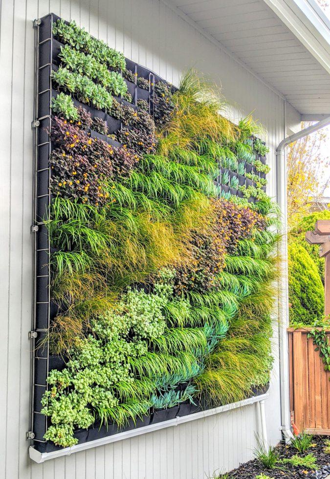 Experiment⁤ with vertical gardens to maximize space in your ⁣landscaping design