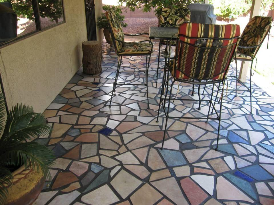 Mosaic Magic: Capture attention⁤ with⁤ colorful mosaic tiles as a centerpiece in your patio design