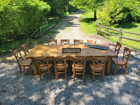 An oversized wooden dining table serves as the heart of ‍any⁣ country⁣ kitchen