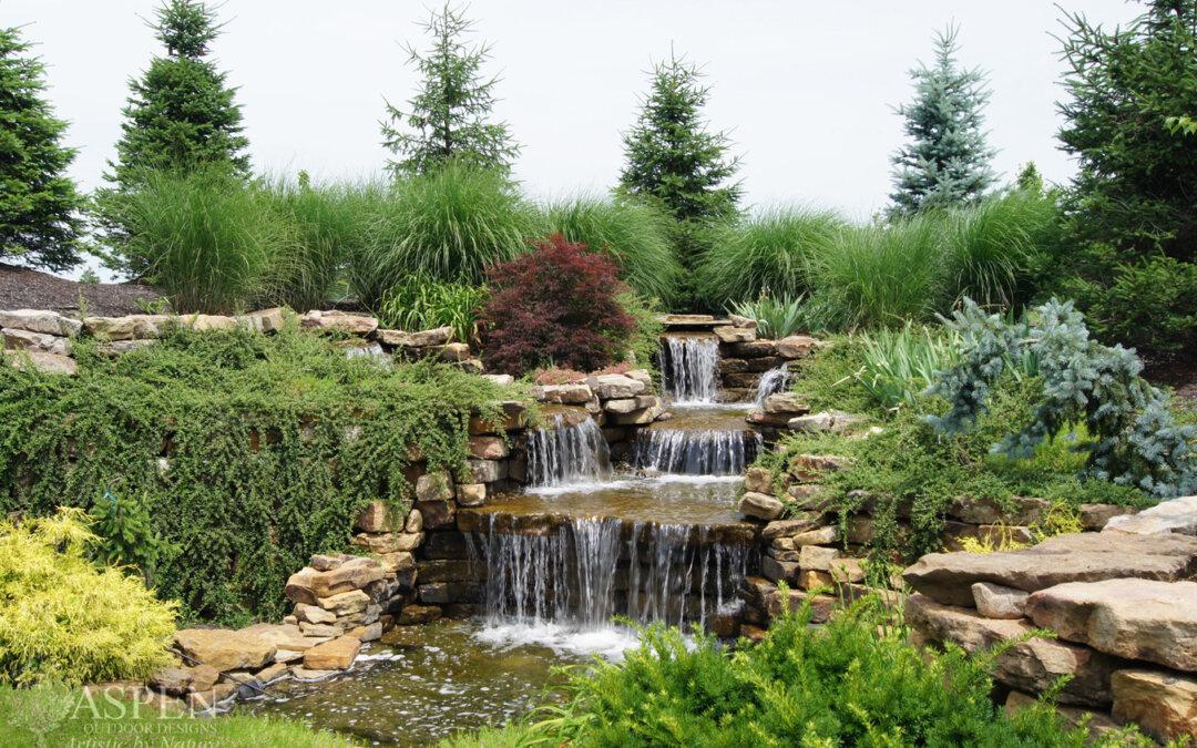 Formulate⁤ a rustic charm with natural stone ​in your landscaping design