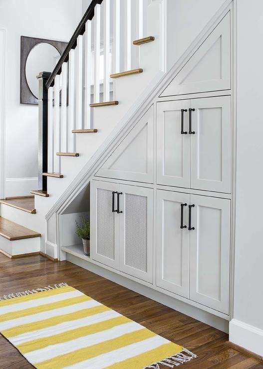 Choose bright colors in your under stairs kitchen to enhance light and openness