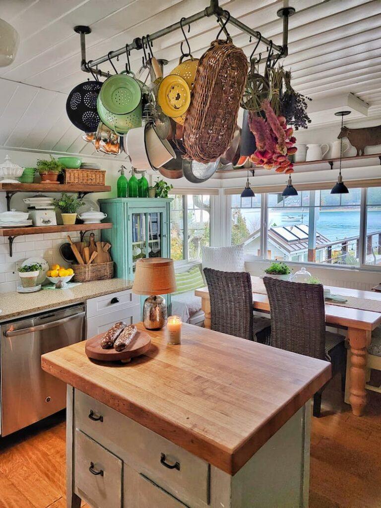 Hang pots and pans on a rack in your Under Stairs Kitchen for easy access