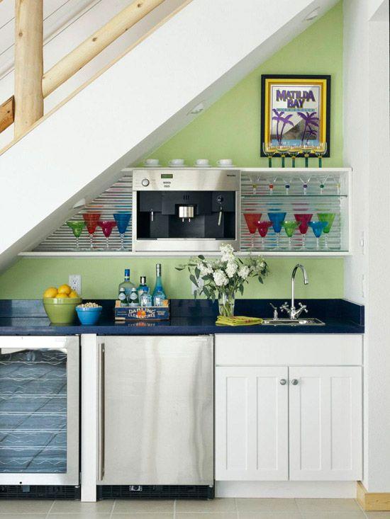 Add a compact refrigerator to your under stairs kitchen for essential food storage