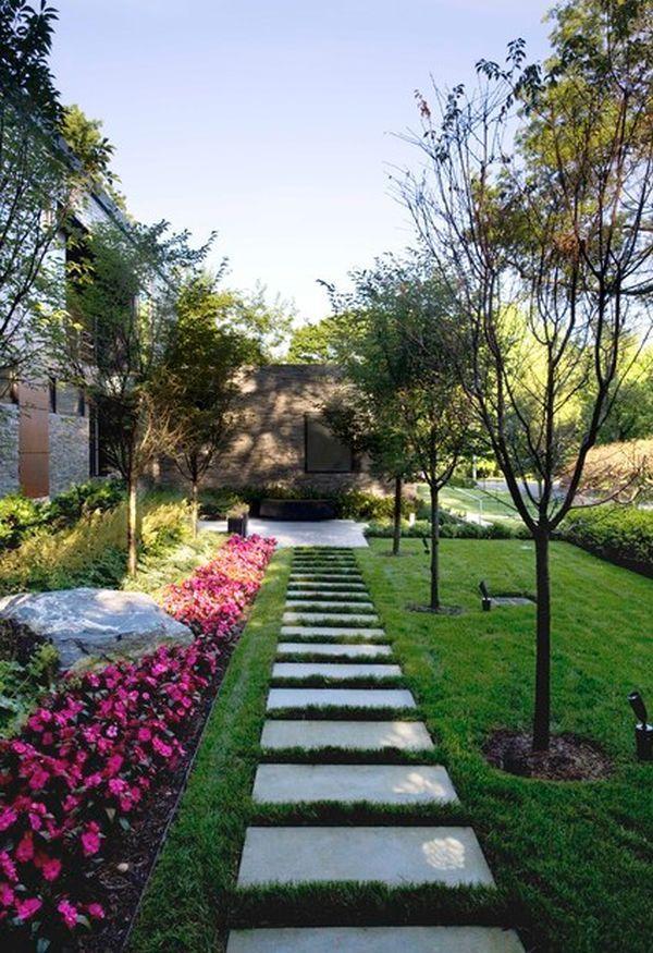 Add stone pathways for a timeless touch in ‌modern landscape design