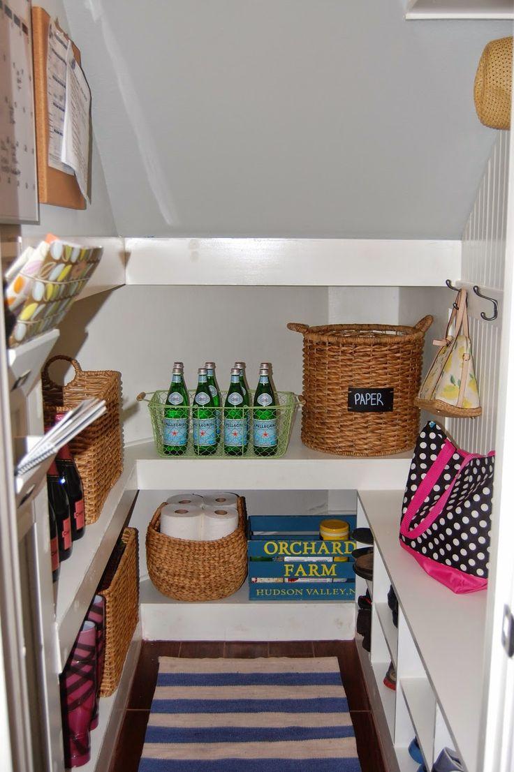 Use basket storage in your Under Stairs Kitchen to keep items organized