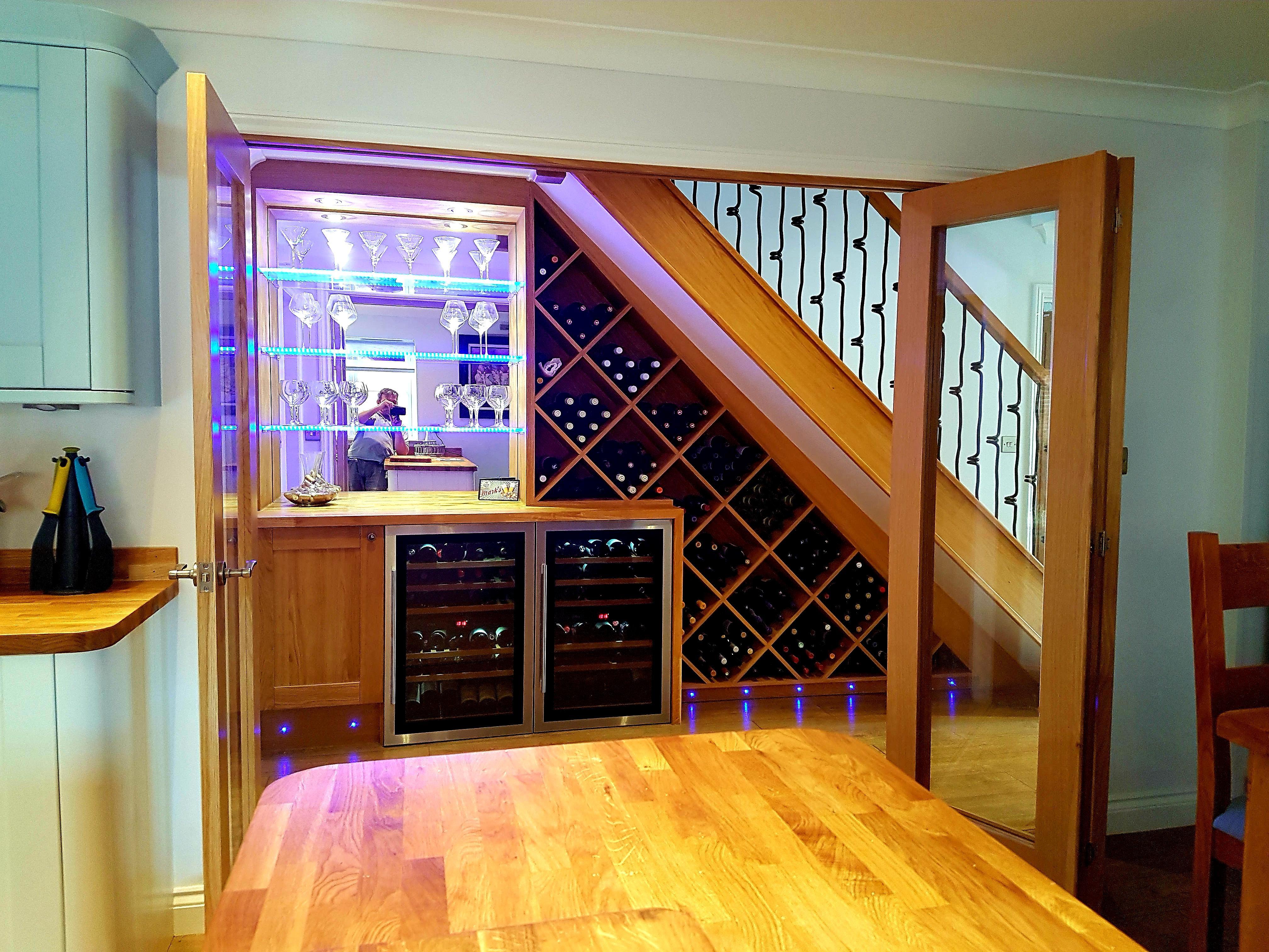 Incorporate⁣ a ​wine rack to add flair to your⁣ Under ‍Stairs Kitchen