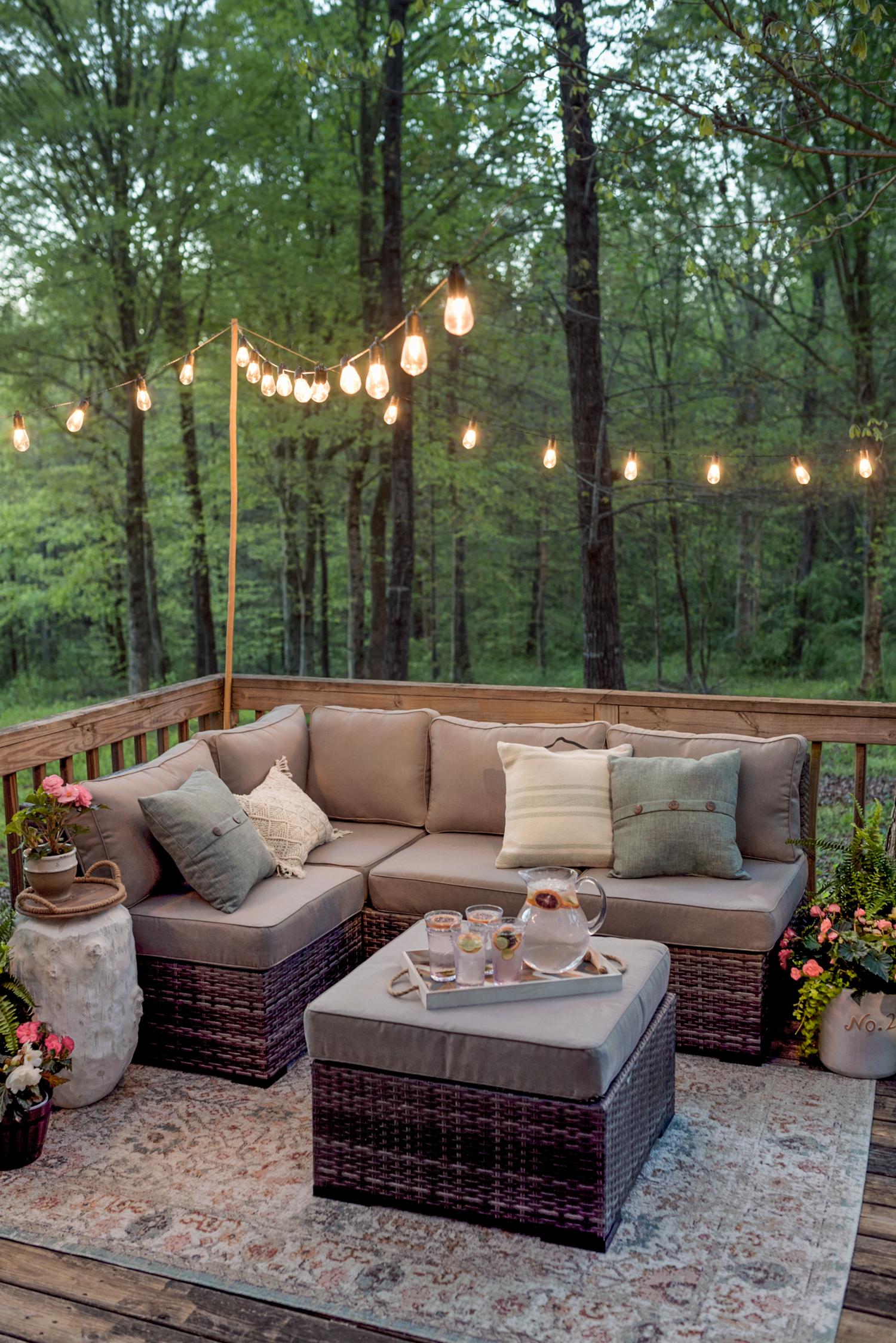 Hang ‌string lights to create a ‍cozy ambiance in your⁢ small⁤ patio ⁢design