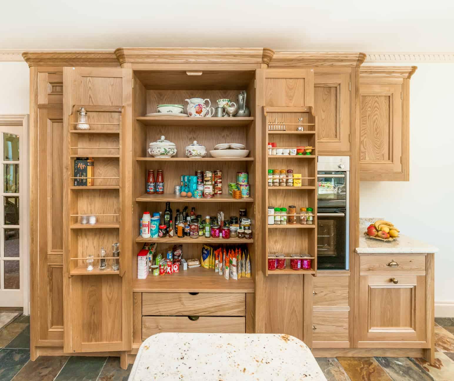 A⁣ traditional pantry adds vintage appeal and organization to your country kitchen