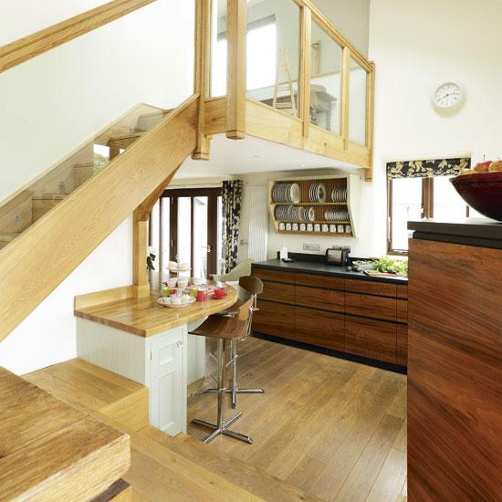 Create a cozy breakfast nook in your Under Stairs Kitchen for intimate meals