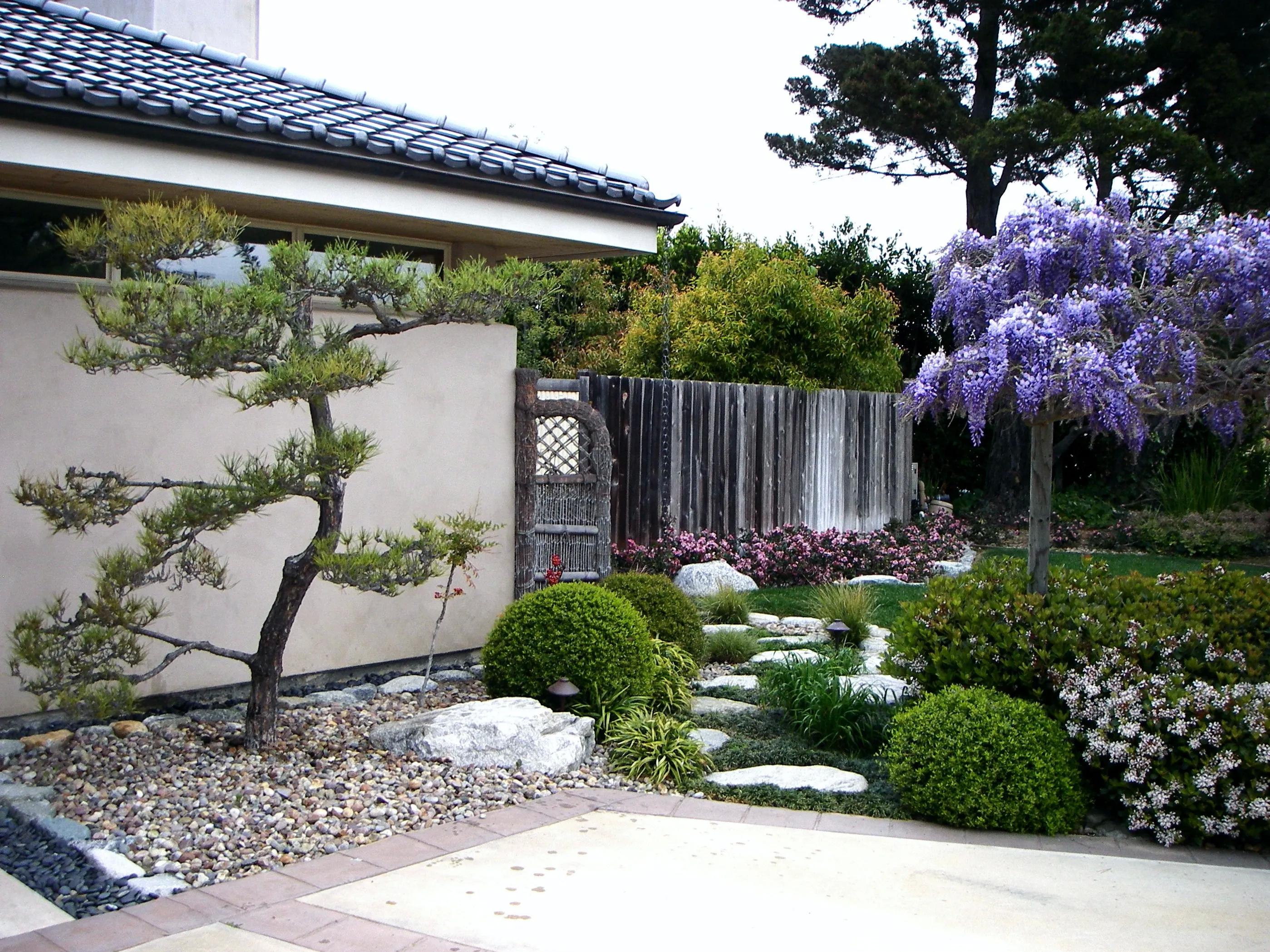 Create a tranquil zen garden with minimalist ⁢landscaping design elements