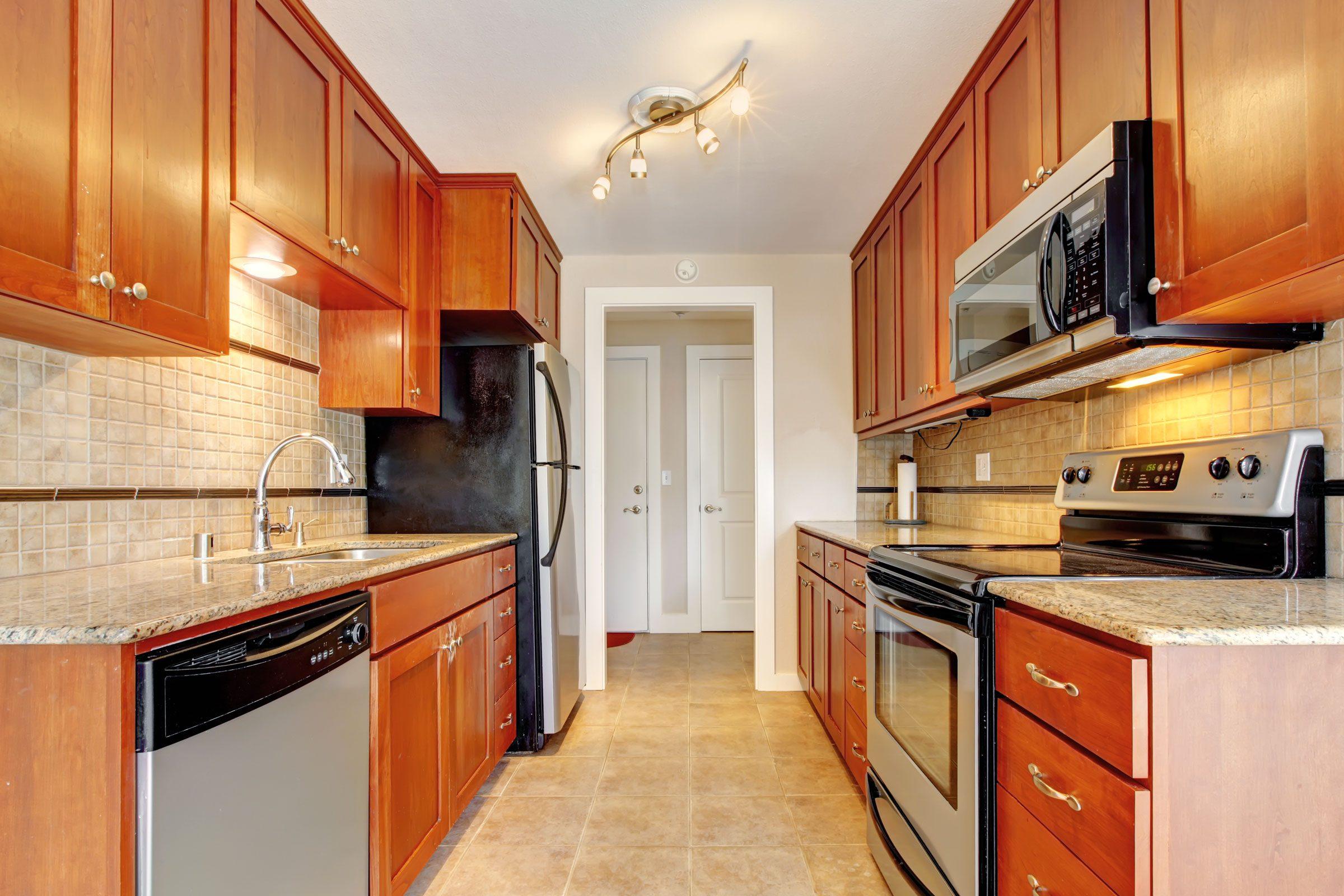 Keep ⁤countertops​ clear by stowing away appliances not in regular use ⁤in your Galley Kitchen