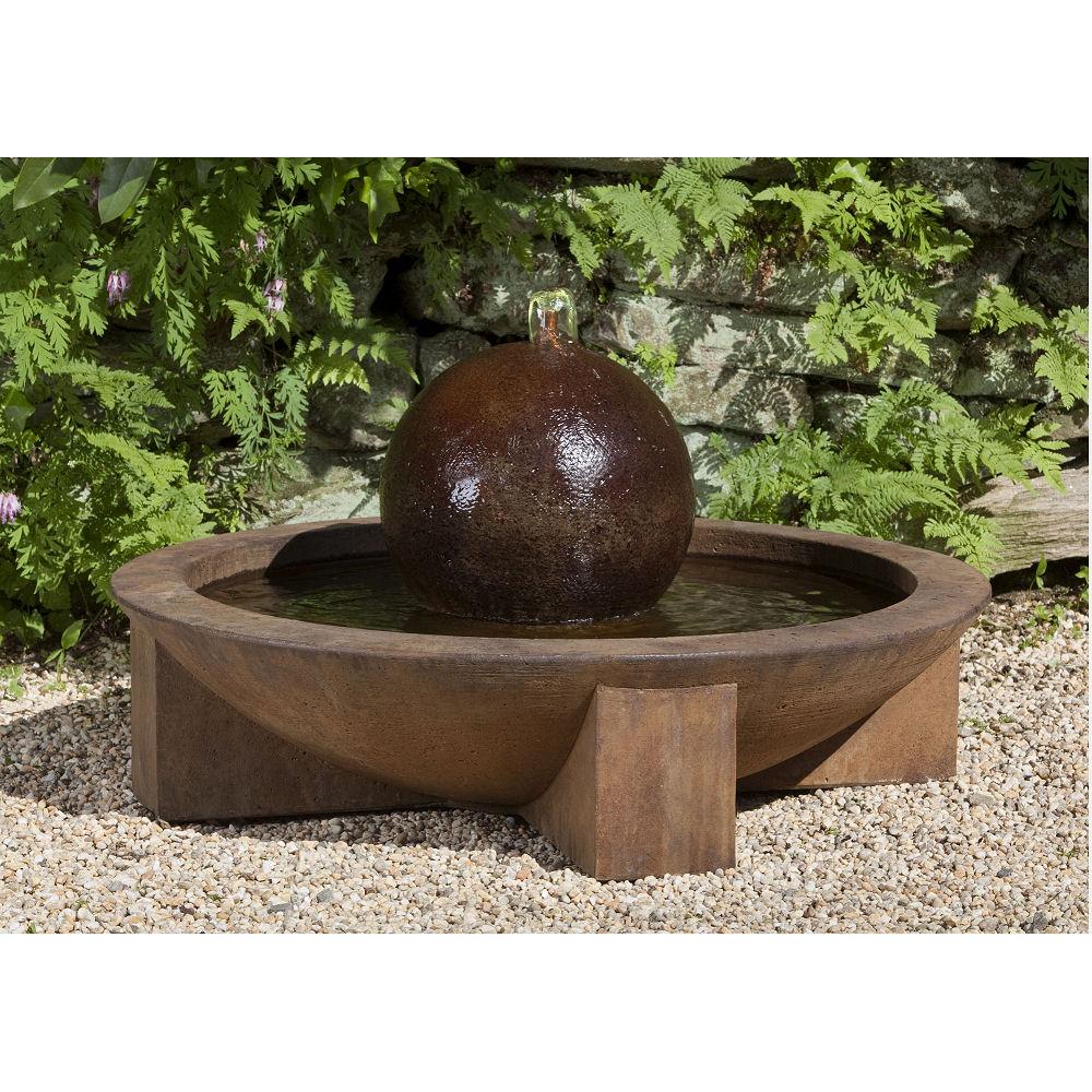 Design a tranquil zen garden featuring decorative stones and soothing water features