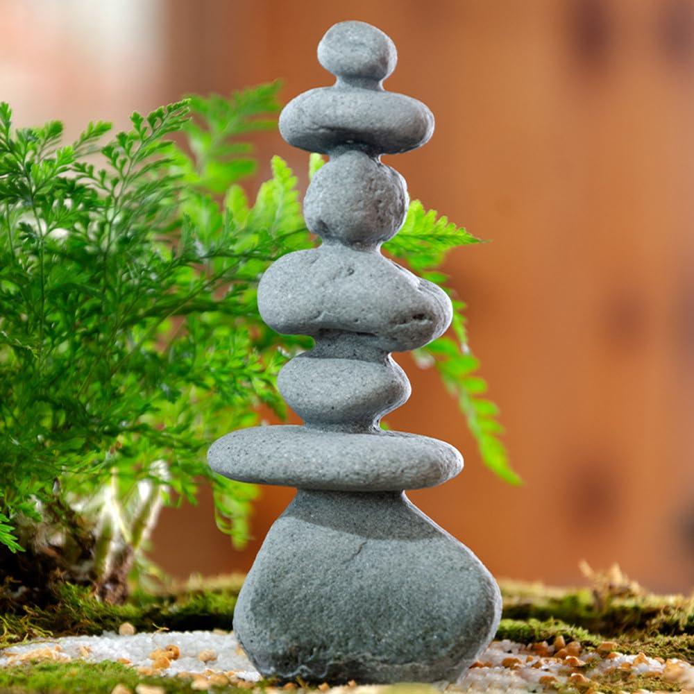 Create a‍ serene Zen garden with rocks and minimalist ‌landscaping design elements