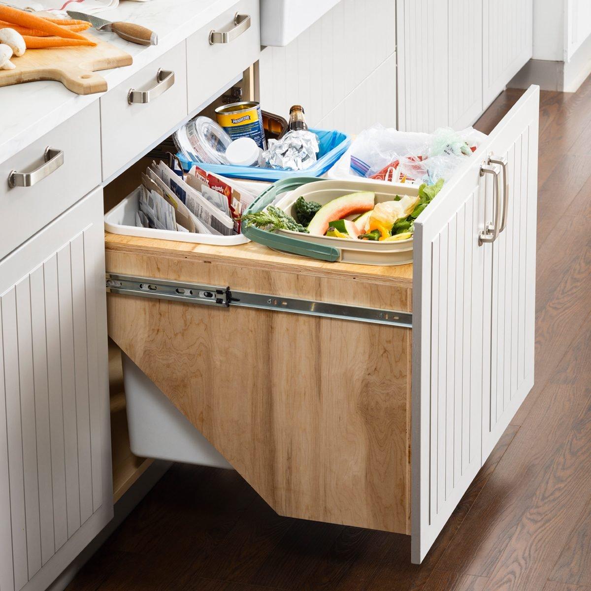 Install a countertop recycling center in your eco-friendly Under Stairs⁣ Kitchen