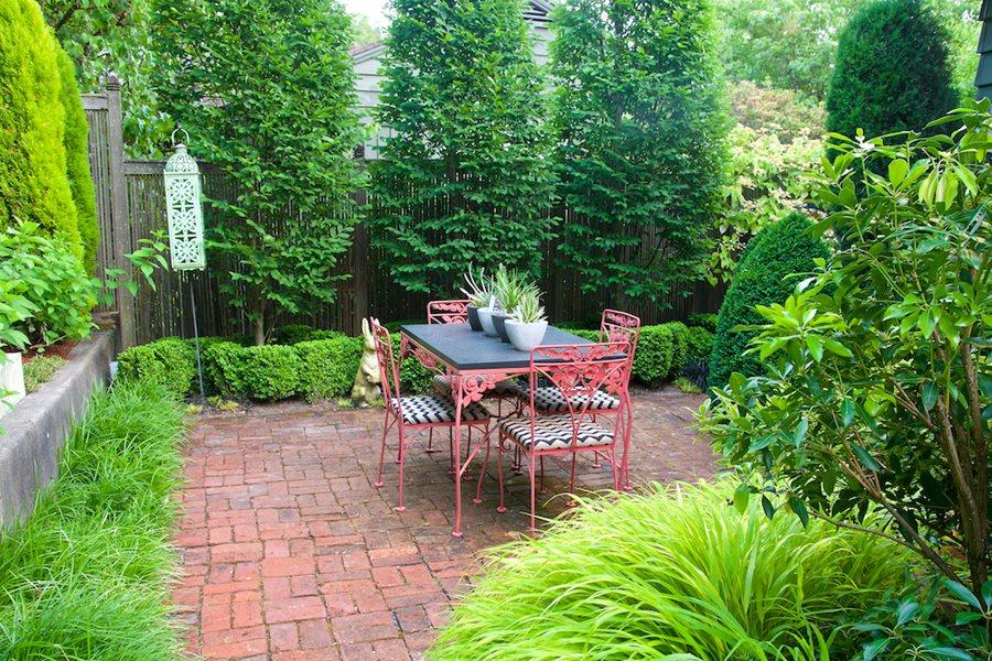 Define spaces with hedges to enhance landscaping design privacy