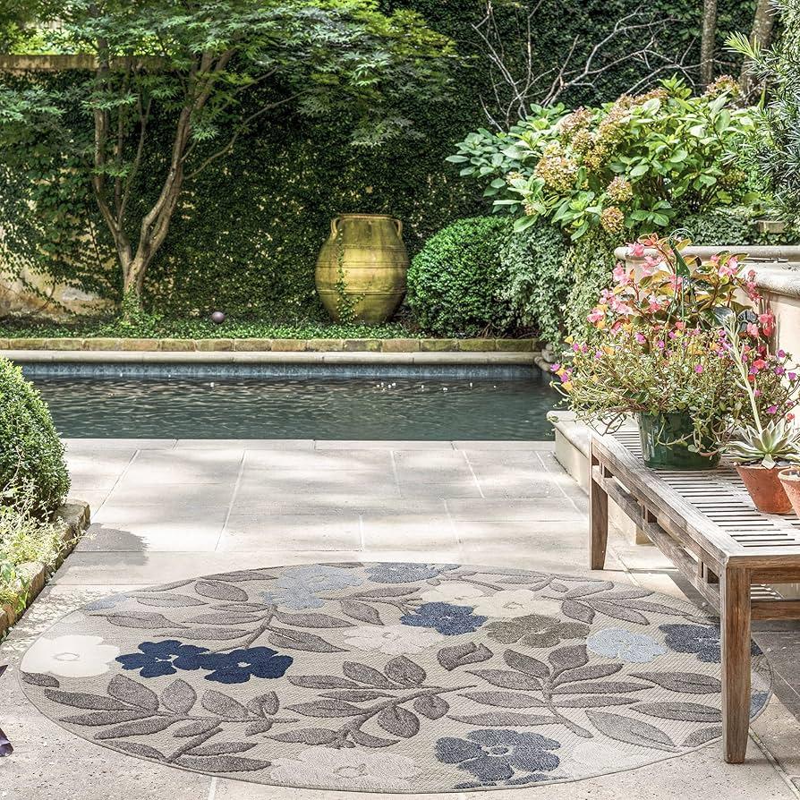 Use patterned outdoor ‍rugs to define spaces ‍in your modern backyard