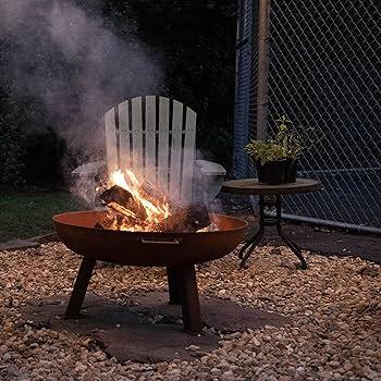 Placing a fire bowl ⁢adds ⁤warmth and charm to‍ your outdoor area