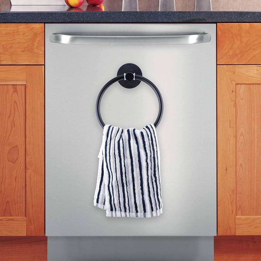 Hang dish towels ⁢on magnetic hooks inside cabinets in⁣ your galley kitchen