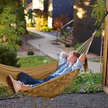 Incorporate ⁤a hammock for ultimate relaxation in your‌ backyard design retreat