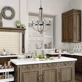 Warm lighting fixtures cast⁤ a cozy ​glow in the heart⁤ of a country‍ kitchen