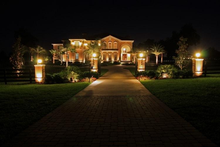 Use lighting to highlight features within your front yard design