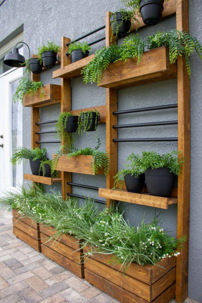 Utilize wall shelves for decorative items in a small ​patio design