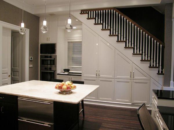 Opt for a sleek, built-in fridge in your Under Stairs Kitchen