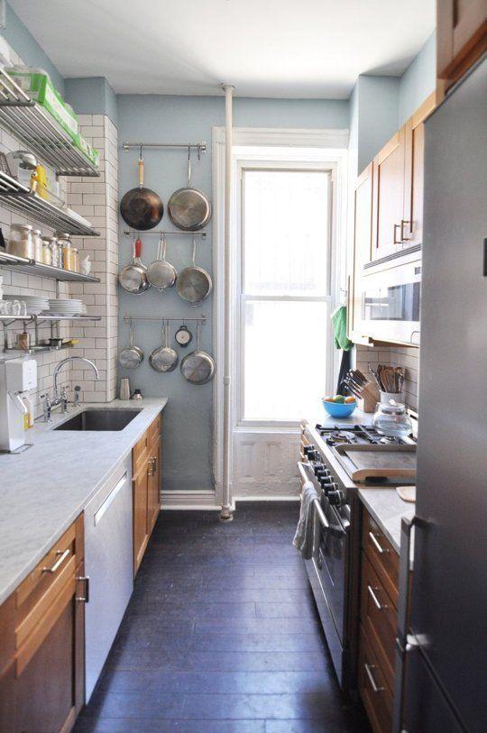 Install a hanging pot rack for easy access in your galley kitchen