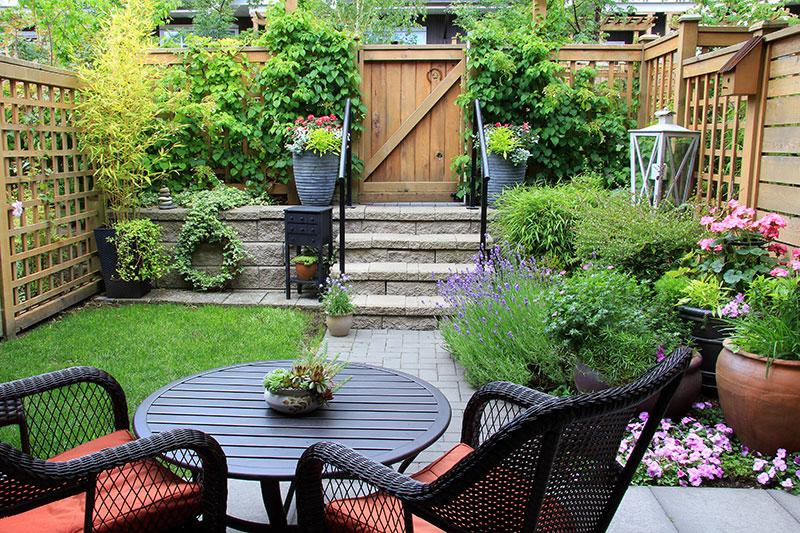 Create a welcoming entryway with potted plants in your front yard design