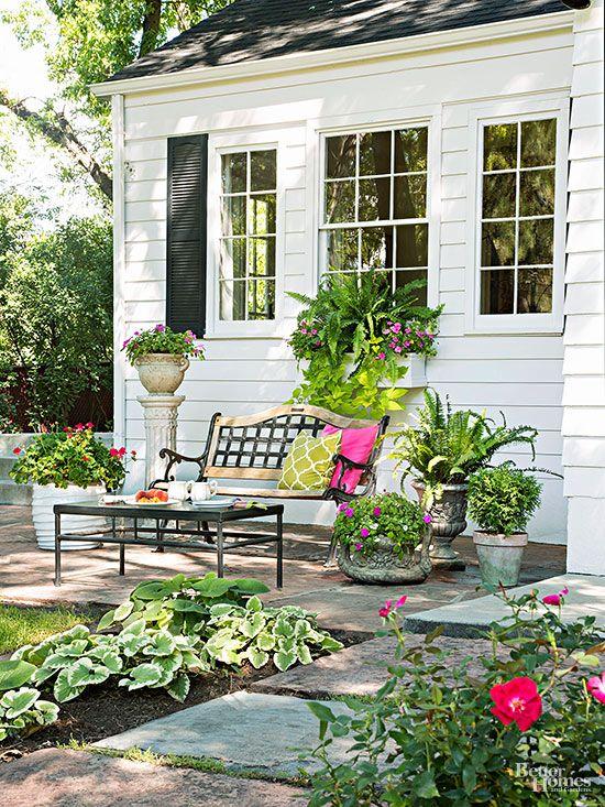 Install a charming bench to enhance relaxation in your front yard design