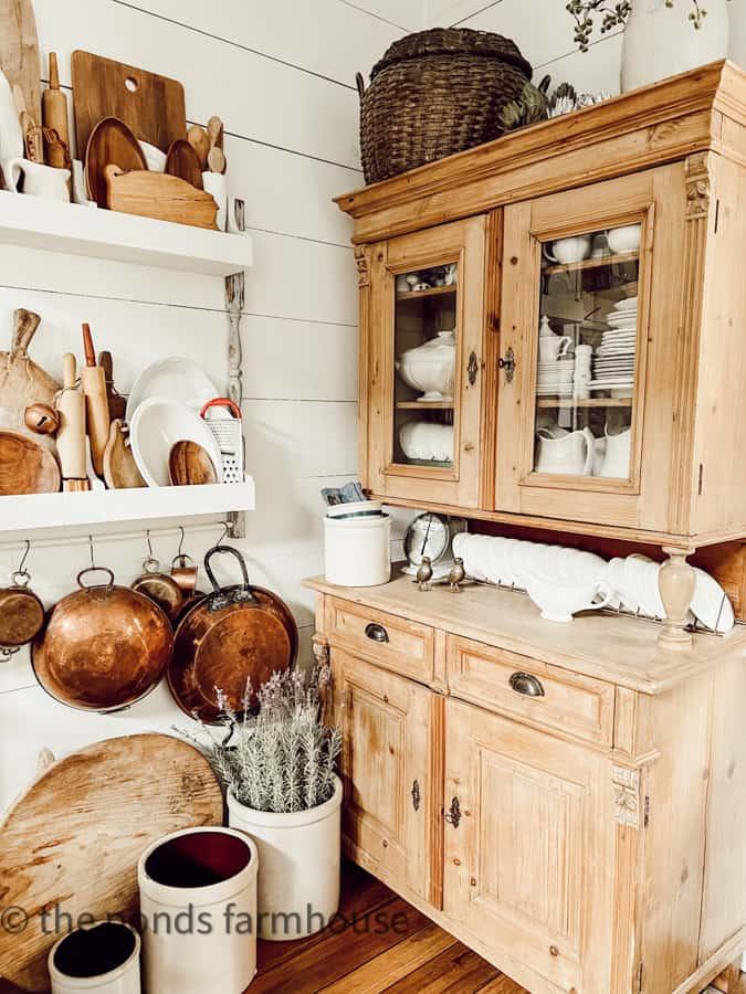 A classic farmhouse hutch showcases ⁣vintage treasures in‍ your farmhouse kitchen