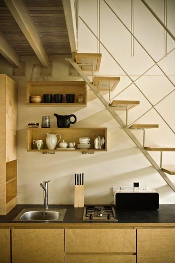 Install a corner sink in your under stairs kitchen to save precious space