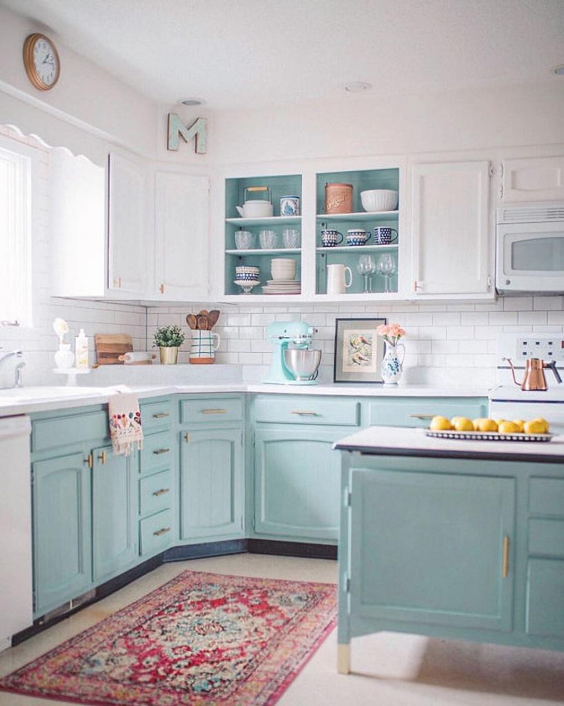 Descending‍ pastel-colored⁢ cabinetry invites a playful‌ feel​ to your country kitchen