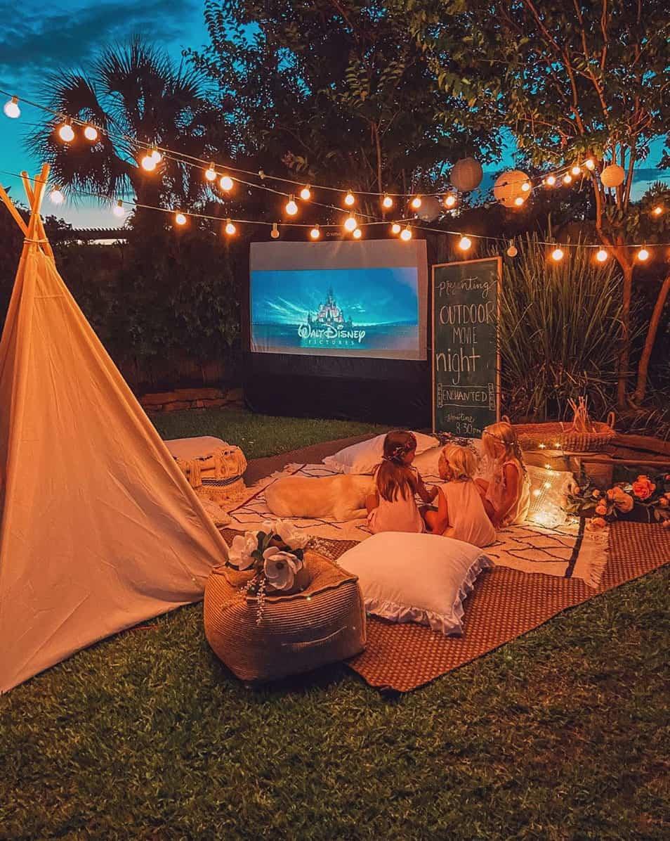 Set up an outdoor movie screen for family-friendly film nights under the stars