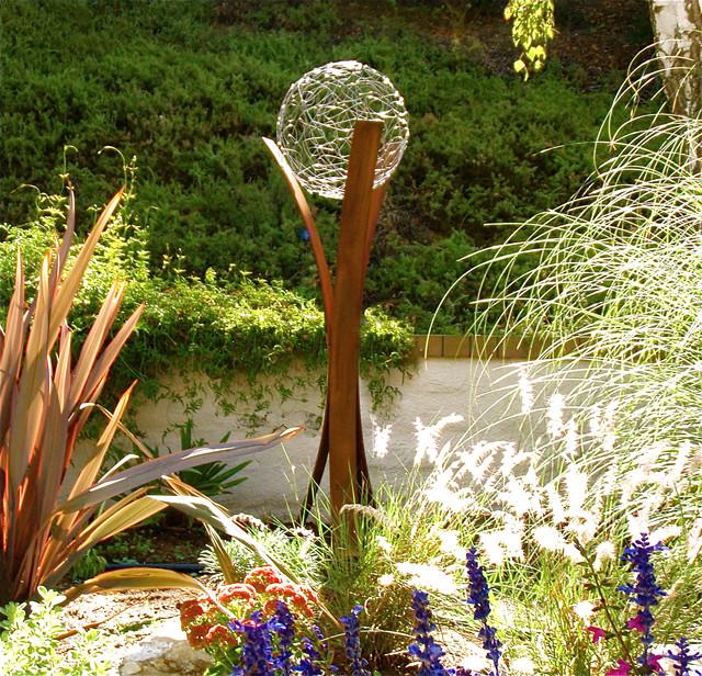 Artistic sculptures serve as unique focal points, transforming ⁤your Landscaping Design