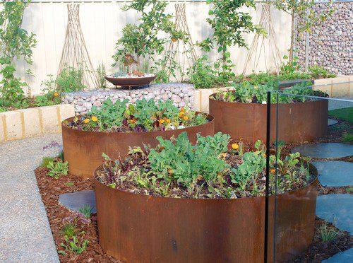 Utilize recycled materials for an eco-conscious front yard design