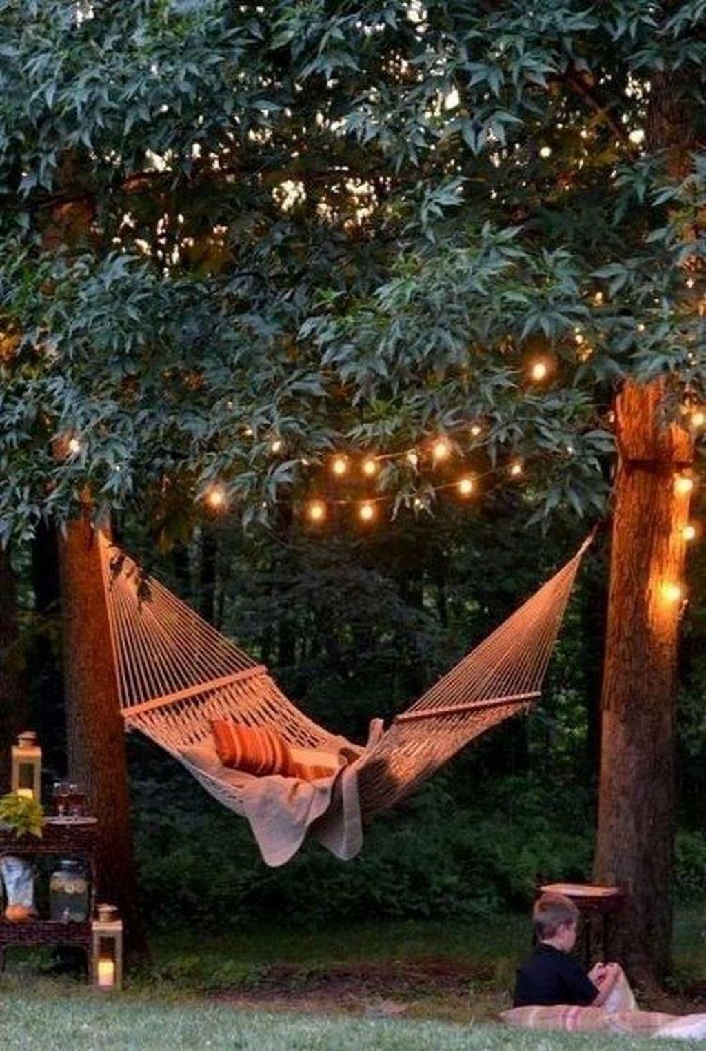 Set ⁢up a hammock for ‍ultimate ⁢relaxation in your backyard design