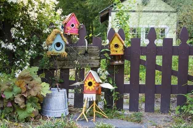 Install a birdhouse to invite feathered friends into your backyard design