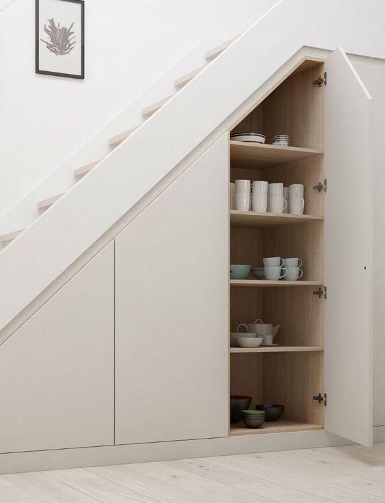 Install hidden cabinets for a minimalist look in your Under Stairs Kitchen