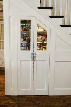 Create an open-plan feel with a glass door in your Under Stairs Kitchen