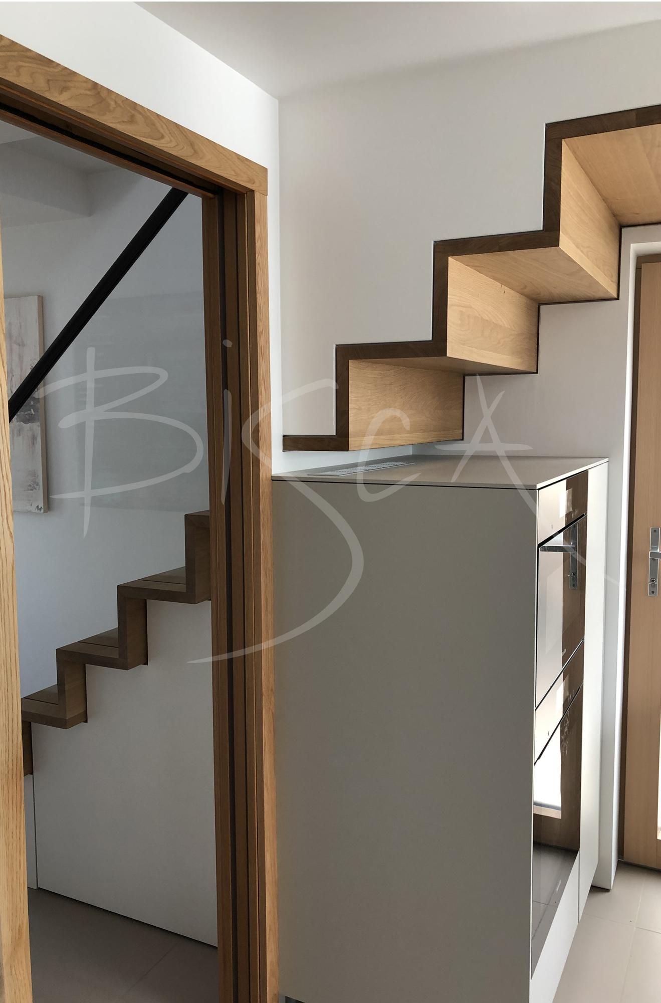 Create an open-air‌ feel with ‌glass​ doors in your Under Stairs Kitchen