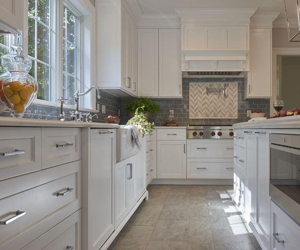 Shaker-style cabinets bring timeless appeal to your ​farmhouse​ kitchen design