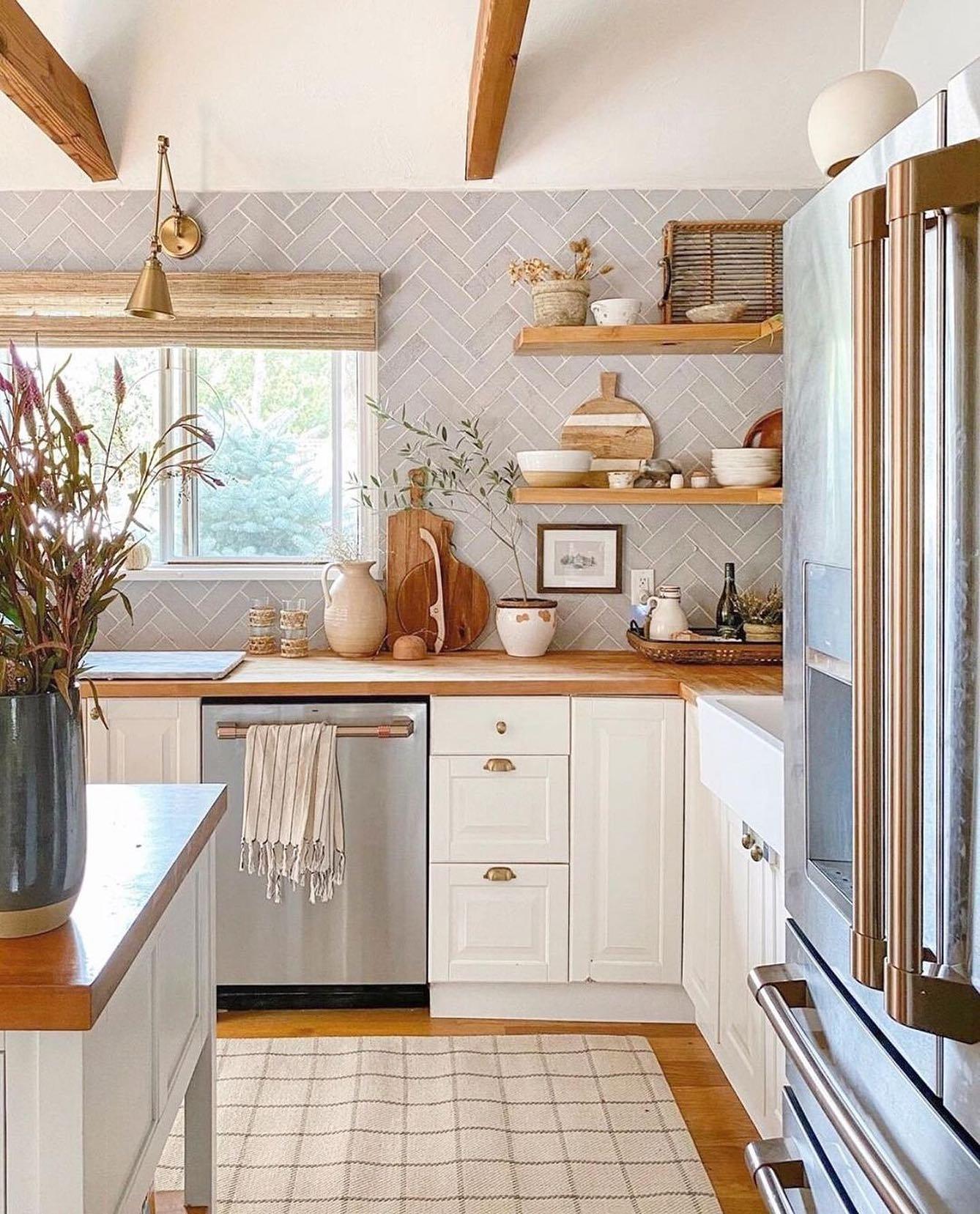 Distressed wood accents that enhance the rustic appeal of your farmhouse kitchen