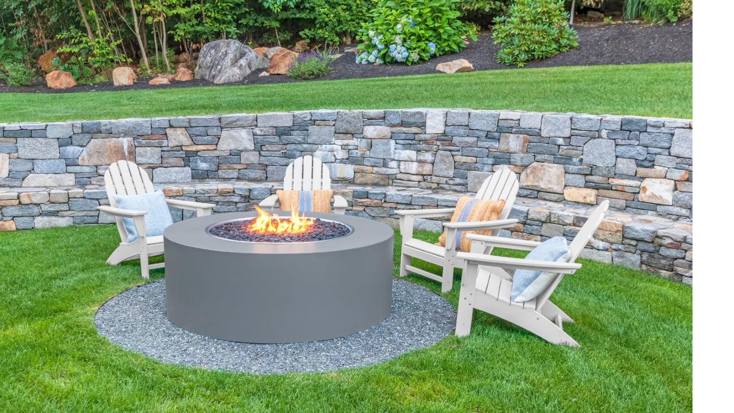 Showcase a fire pit as a focal point in your landscaping design