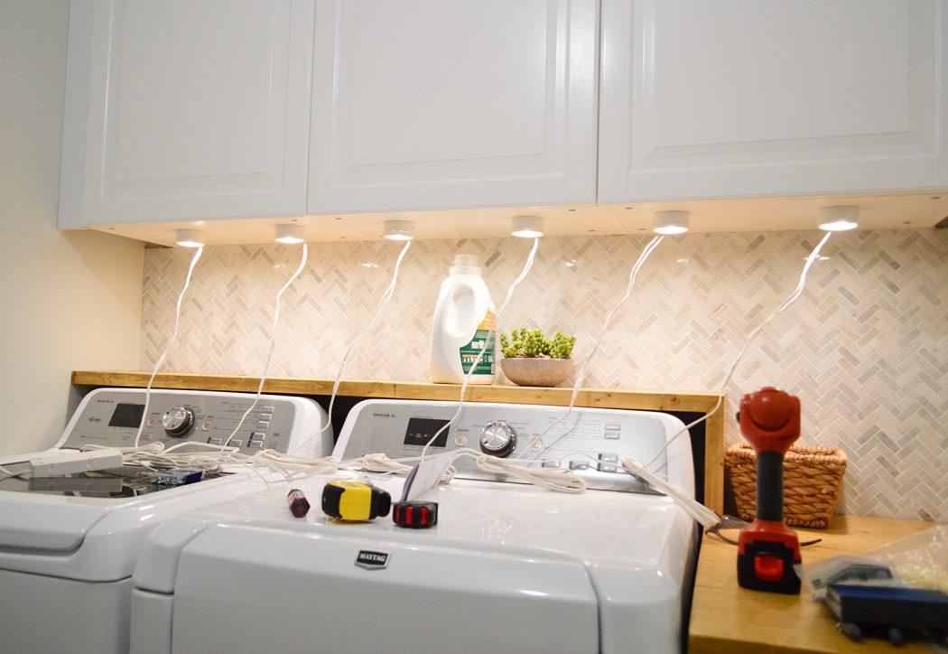 Install under-cabinet lighting to brighten your galley kitchen