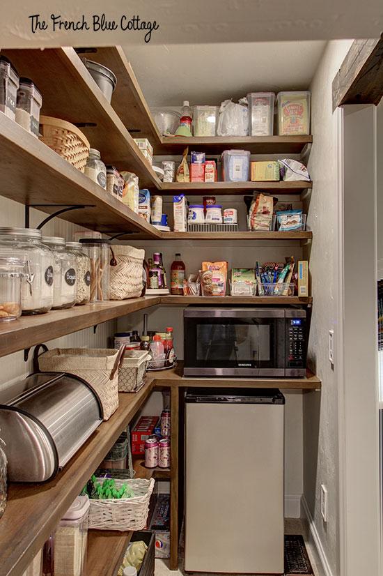 Add a pull-out pantry in your Under Stairs Kitchen for easy access