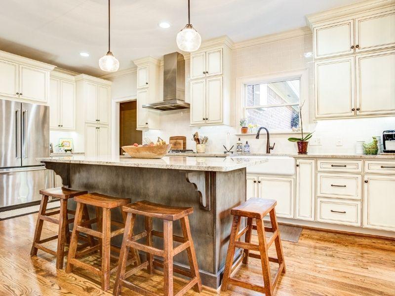 A farmhouse kitchen ⁣island provides extra prep space and casual seating for family