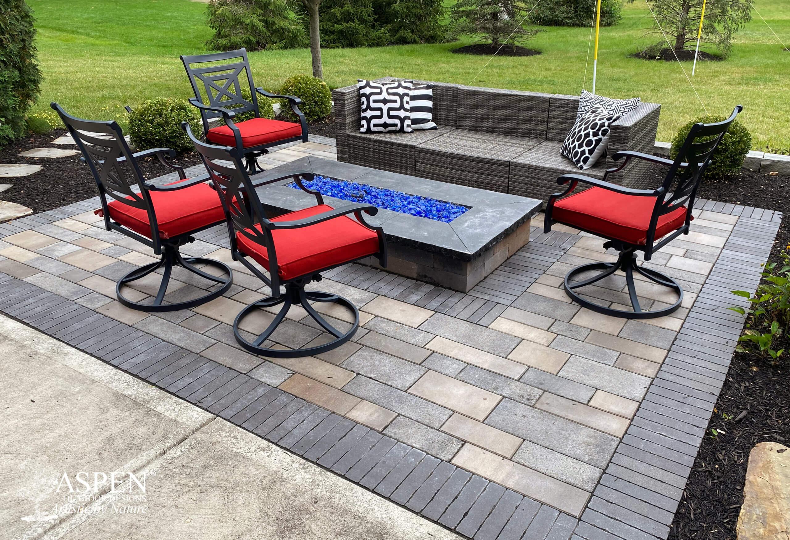 Create a ⁣border using colorful ⁢pavers​ to define spaces in your backyard design