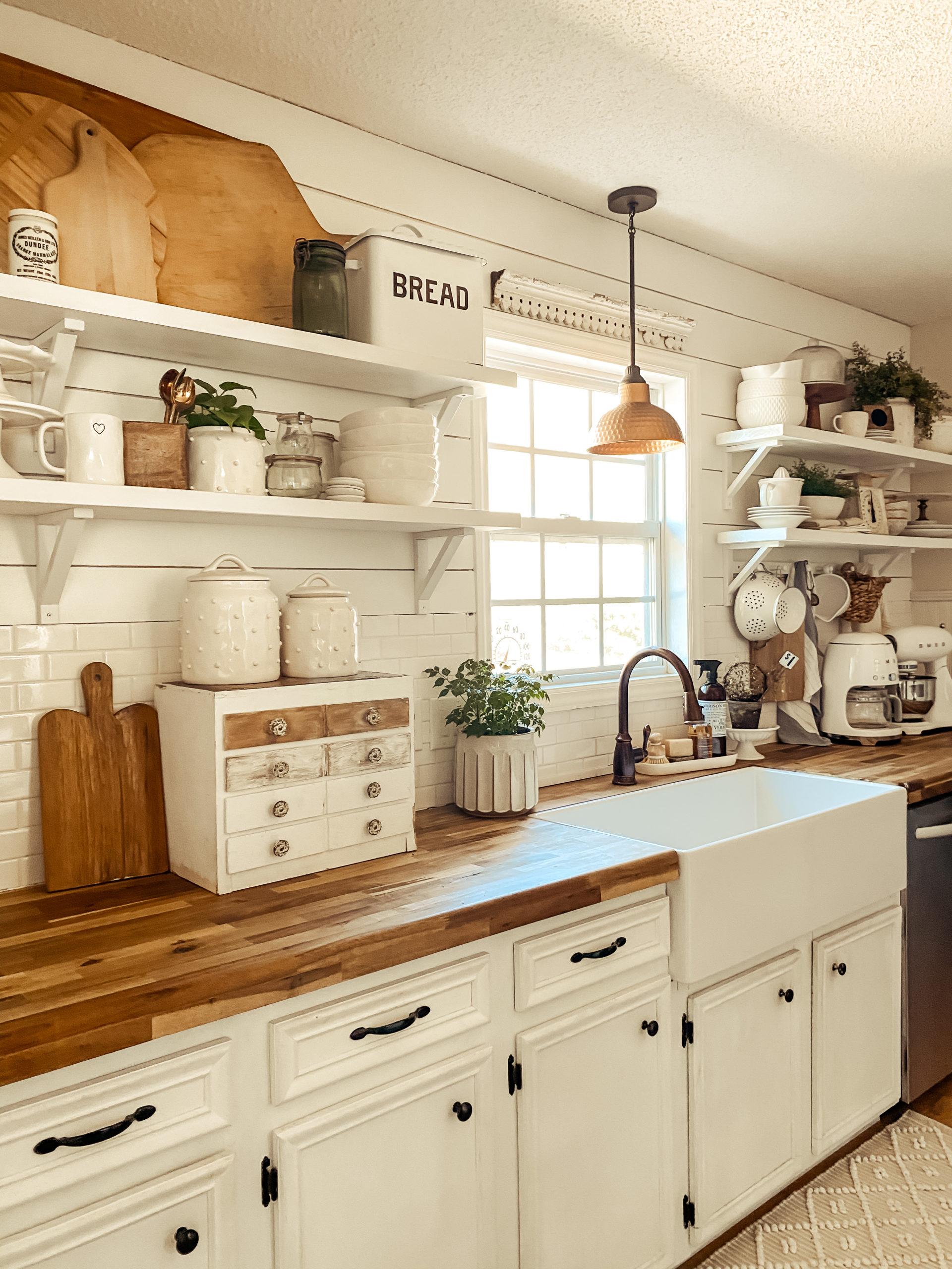 Invest in open shelving for a welcoming feel in your farmhouse kitchen