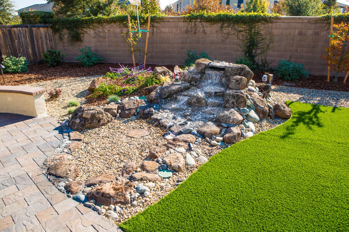 Incorporate water features for a refreshing twist in your landscaping design